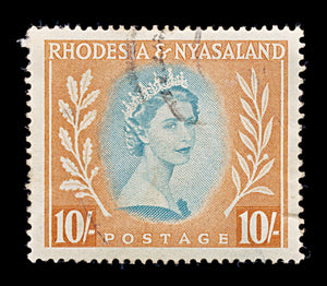 8385: Rhodesia & Nyasaland SG14 10s Orange & Green 1954 Sc#154 Mi15 Used C£11